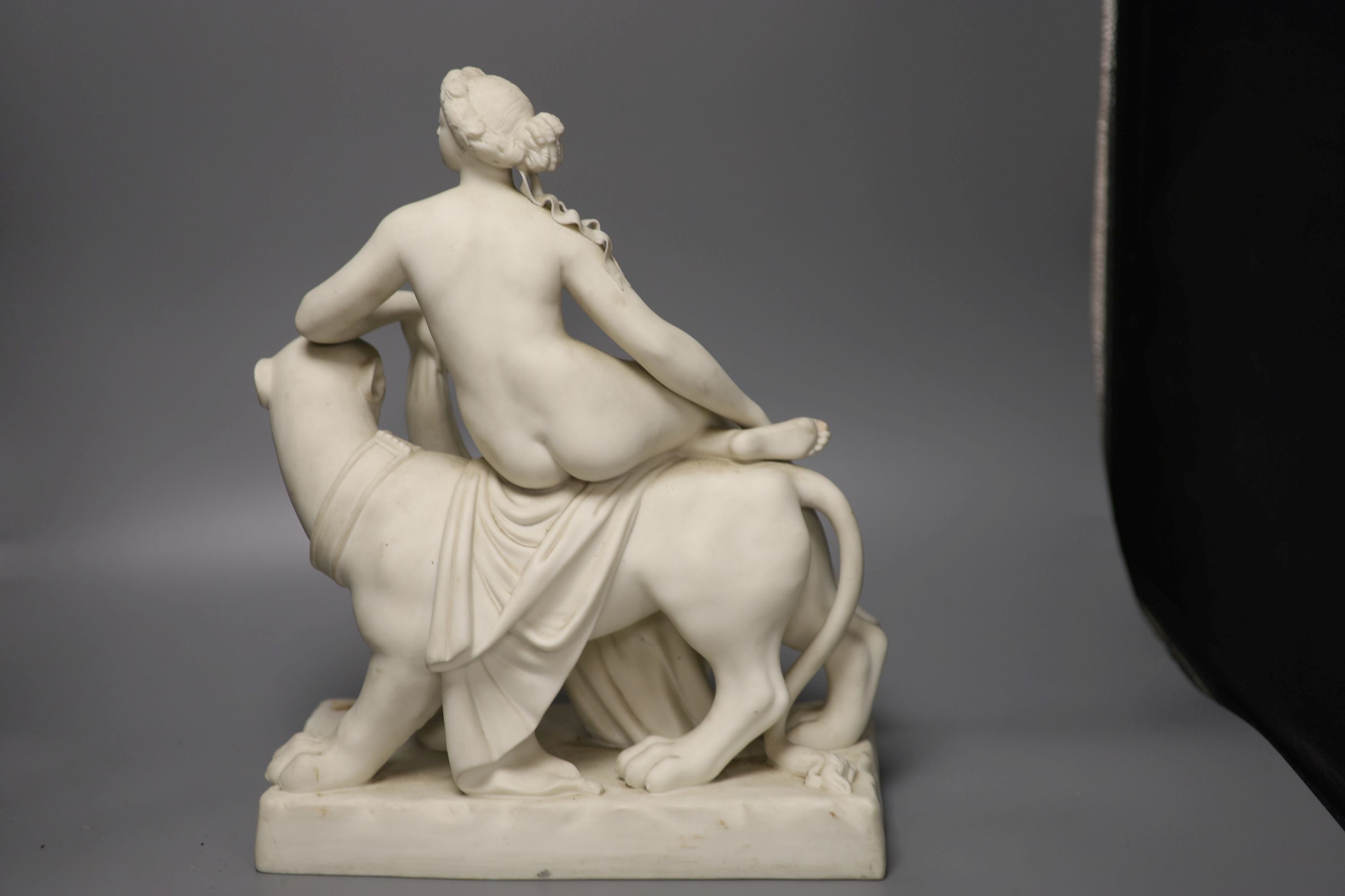 A Minton parianware figure of Ariadne and the panther, height 37cm